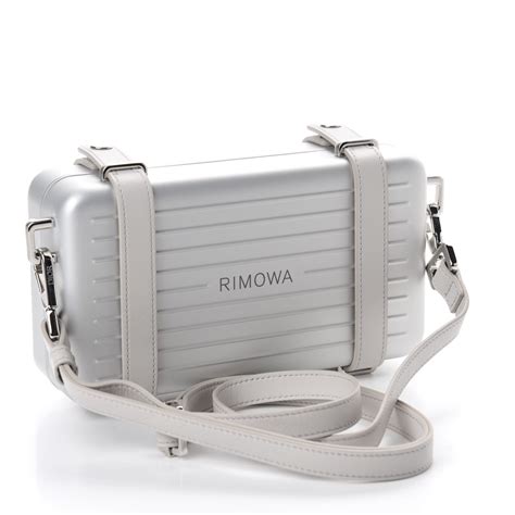 dior and rimowa clutch|christian dior silver strap clutch.